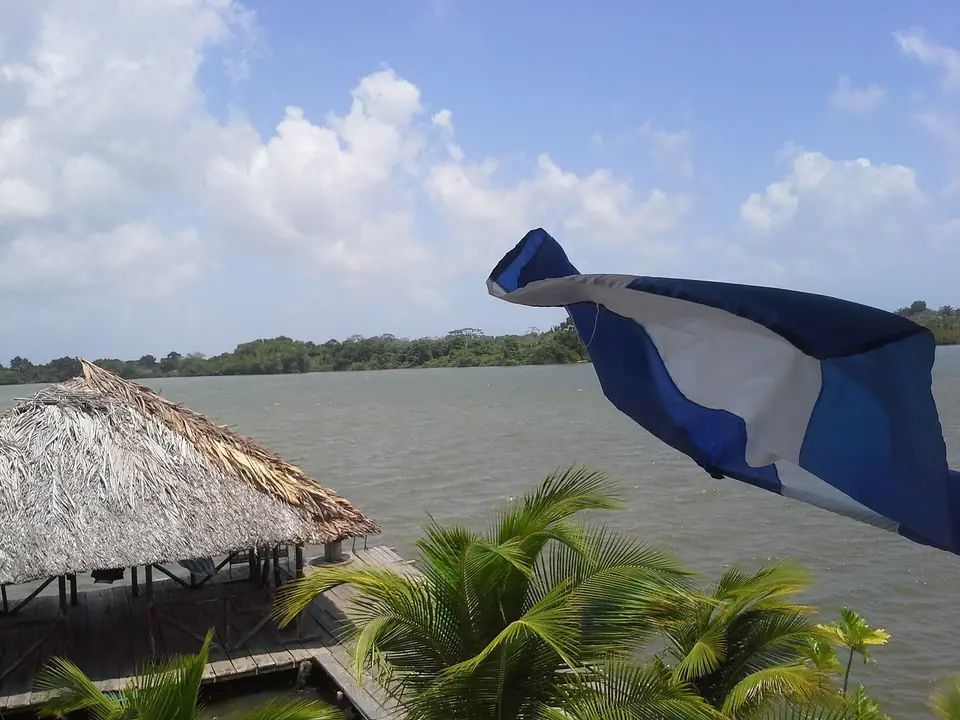 Pearl Lagoon with a Nicaraguan flag and a thatched hut