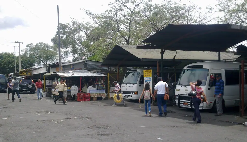 Minibuses waiting for passengers at the UCA terminal in Managua